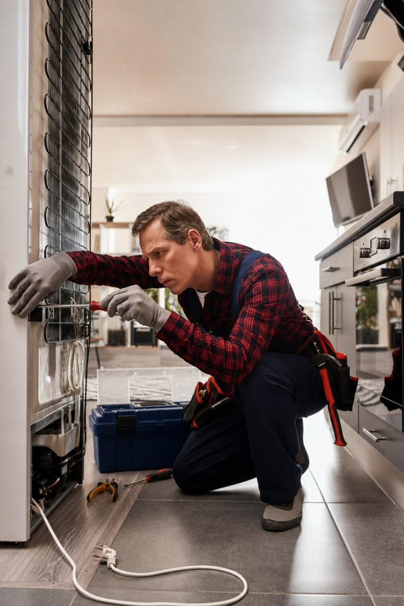 Technician servicing hardware in a workshop